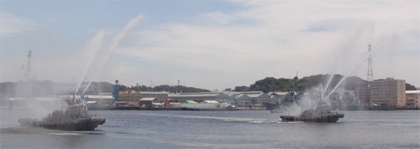 Tugboats discharging